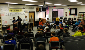 Team members met with middle school boys to talk about respect towards others