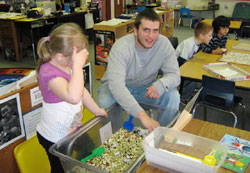Oskaloos native Shawn VanRheenen was one of many Statesmen football players who spent time with local preschoolers