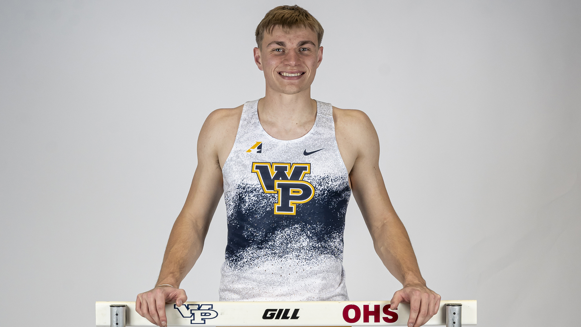 Higginbotham, West Earn Crowns at Grinnell