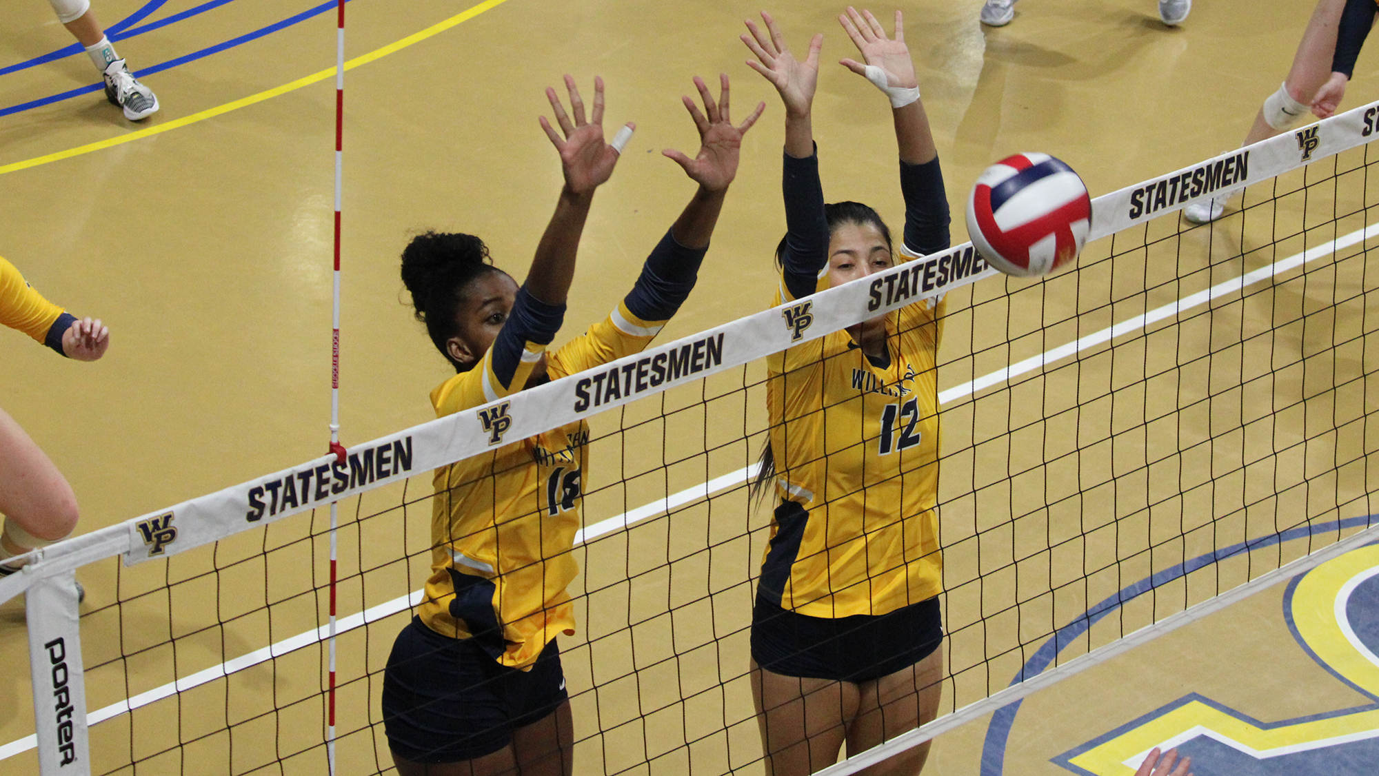 Big Defense Not Enough in Four-Set Loss to Ravens